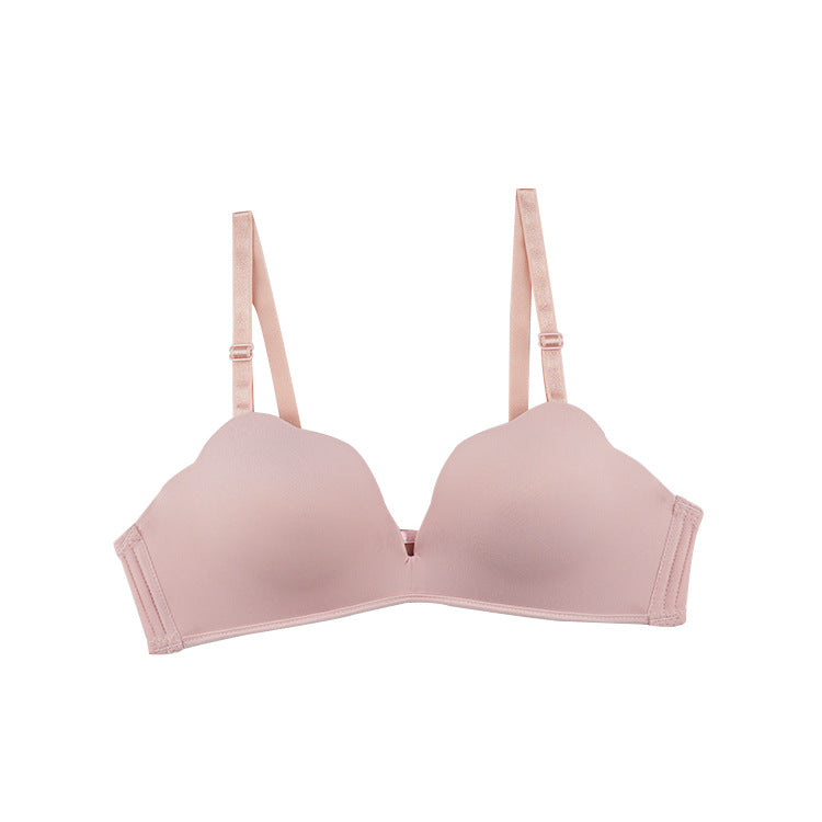 Small bust model wearing wireless push-up bra with adjustable straps
