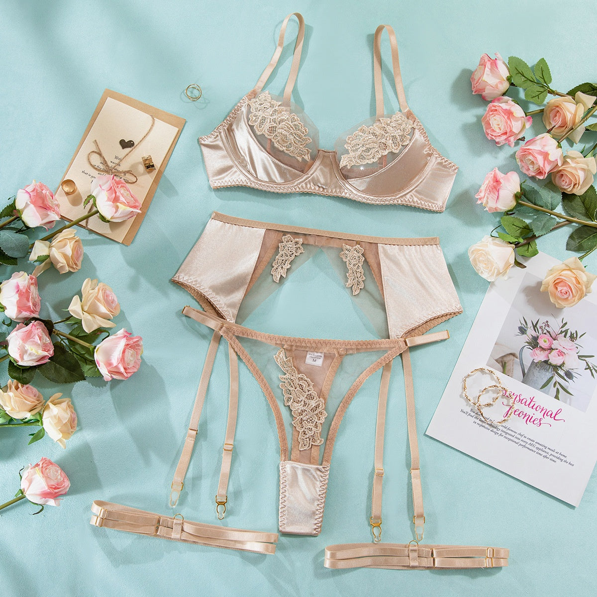 “Front view of mesh embroidery splicing bra set with gathered design and four-piece lingerie set”