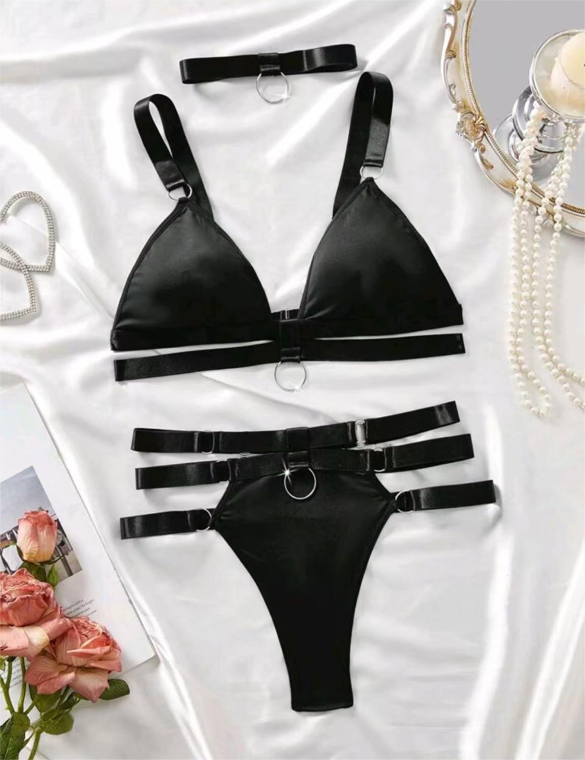 “Close‑up of the metal accents on the milk silk V‑neck bikini top”