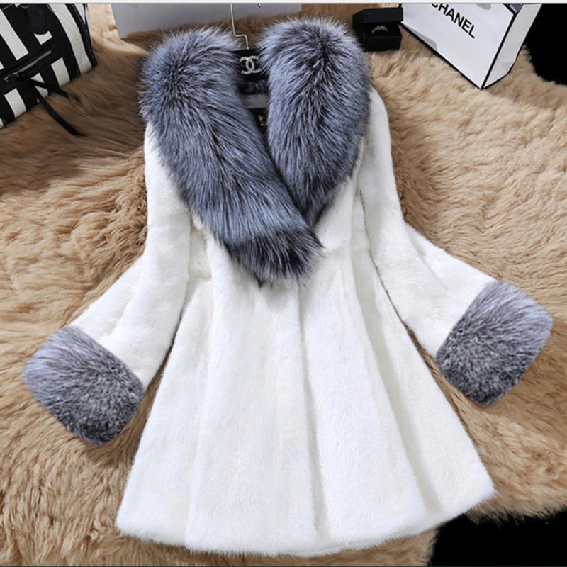 Plus size woman wearing long artificial mink hair coat with big fox fur collar