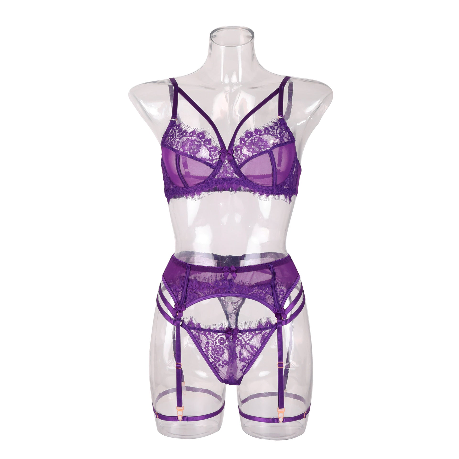 “Full view of French lace purple lingerie set including bralette and thong”