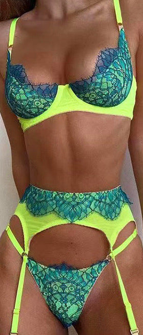 Model wearing the sexy three-piece Wild Rose lingerie set highlighting curves