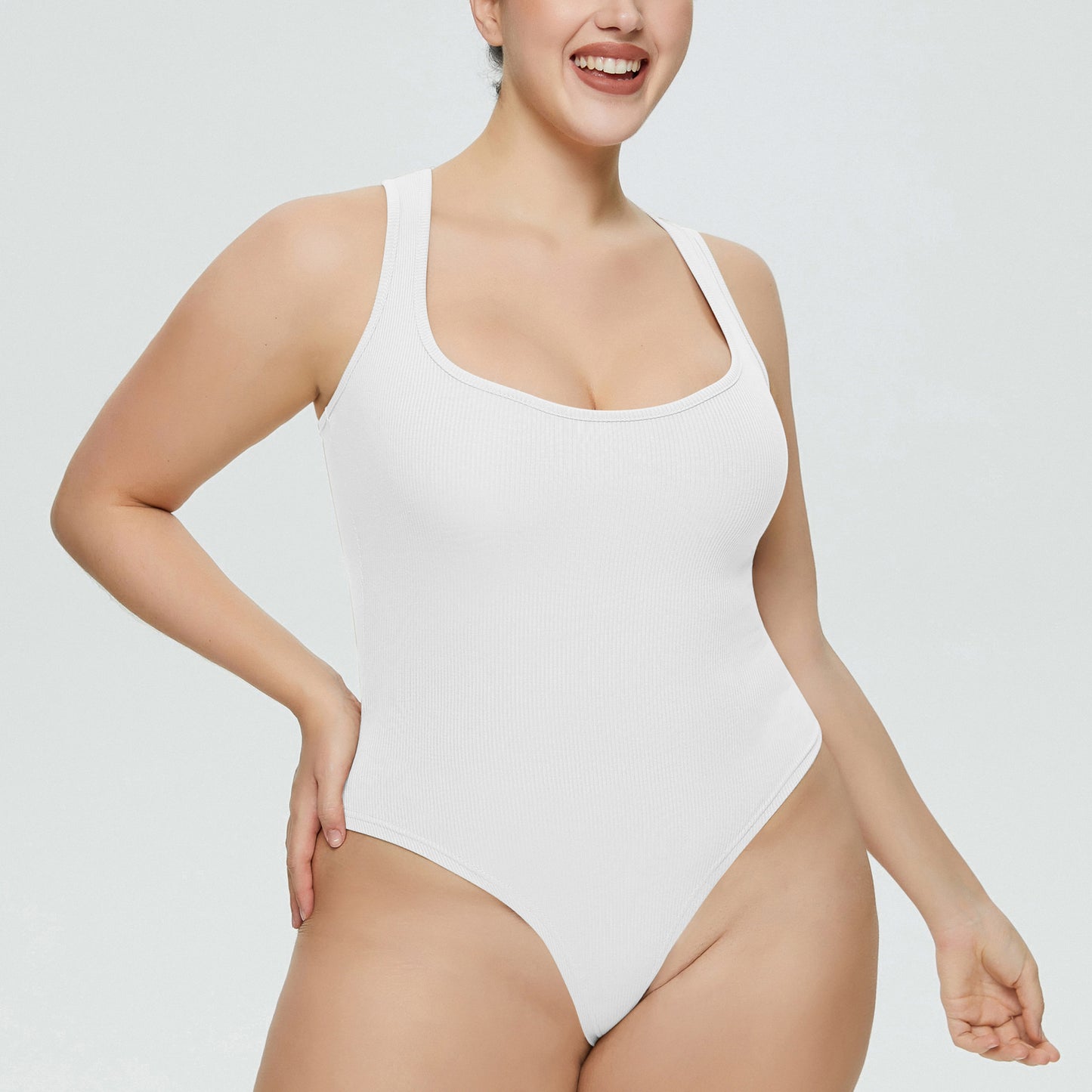 Back view showing thong design and lace-up detail