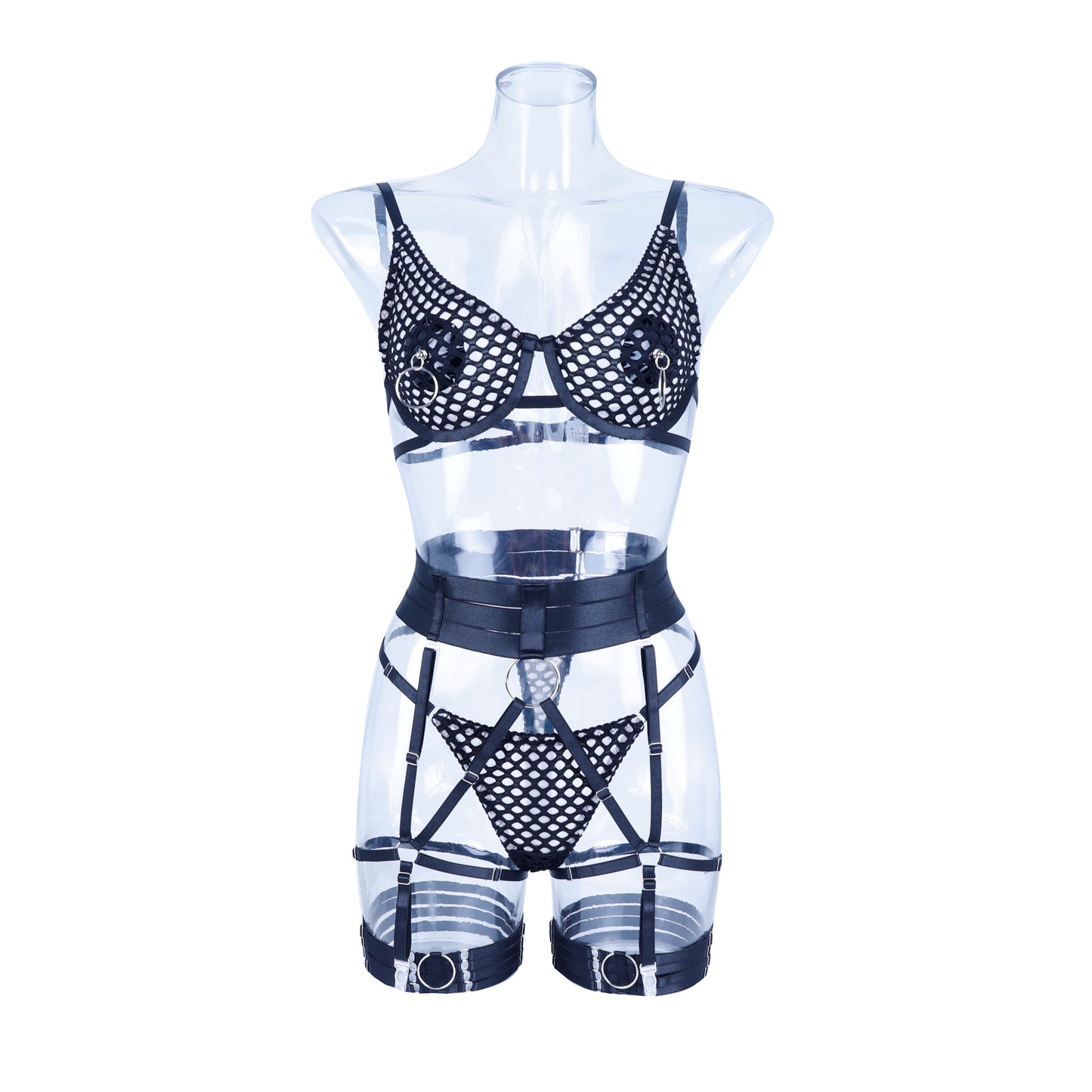 Close-up on patchwork lace, sheer panels, and decorative straps of the plus size erotic set