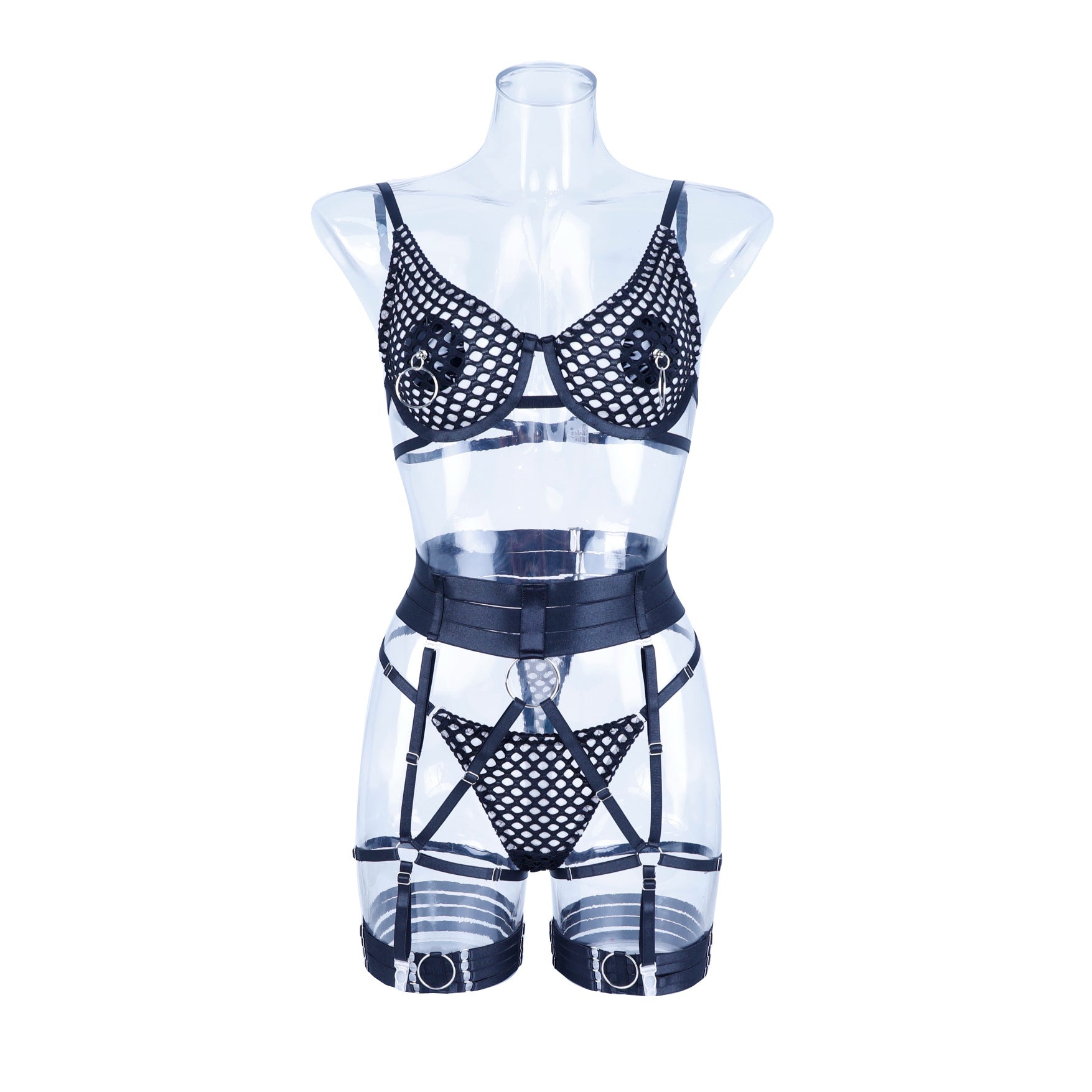Close-up on patchwork lace, sheer panels, and decorative straps of the plus size erotic set
