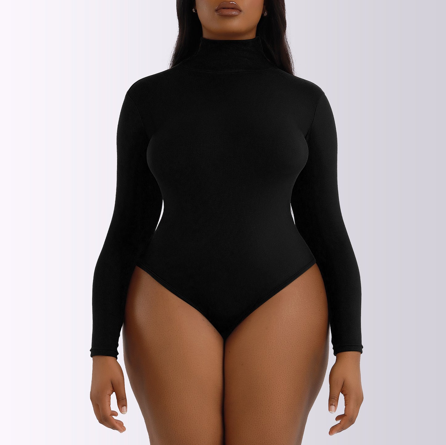Side view showing curve-hugging fit and long sleeves
