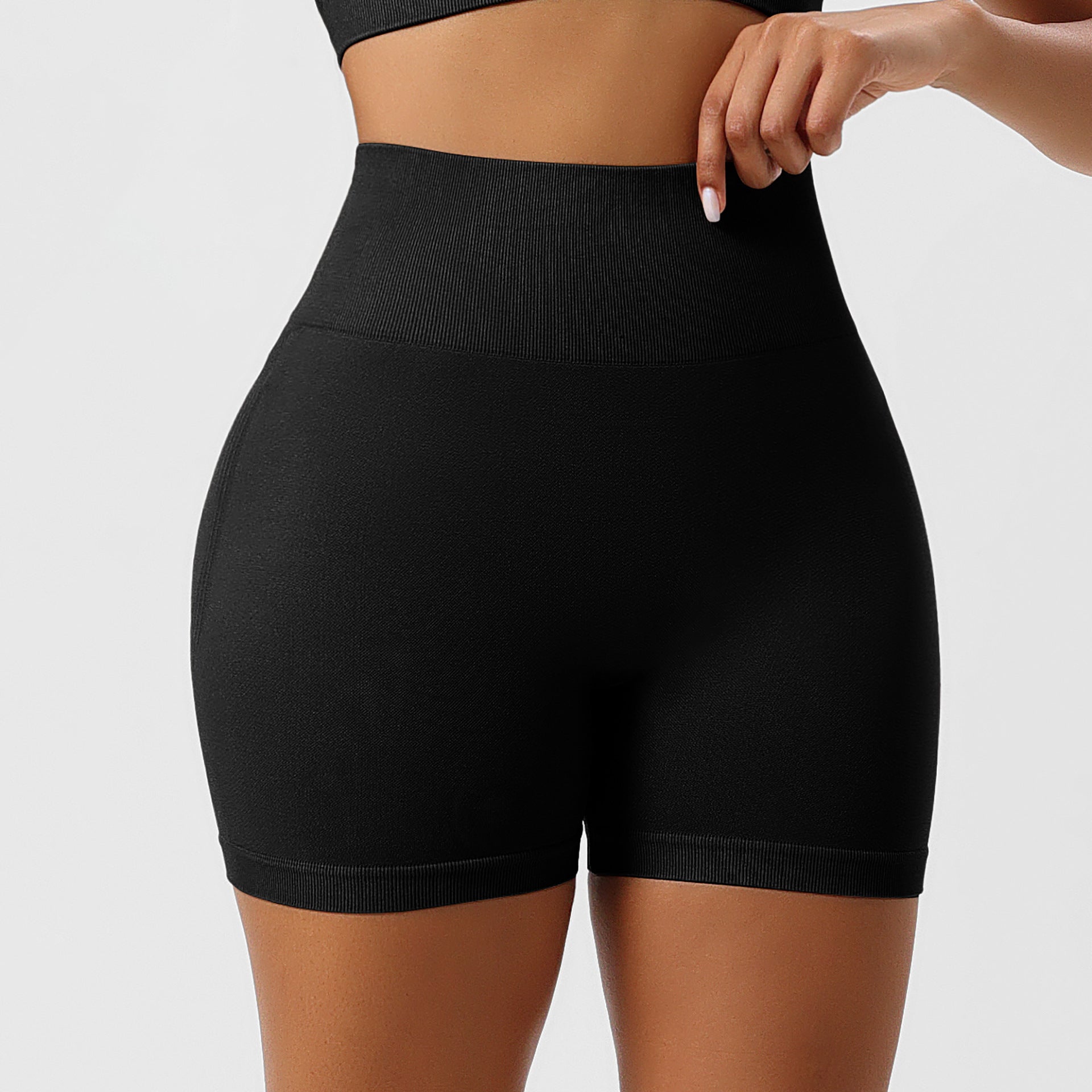 Plus size woman wearing butt-lifting yoga leggings