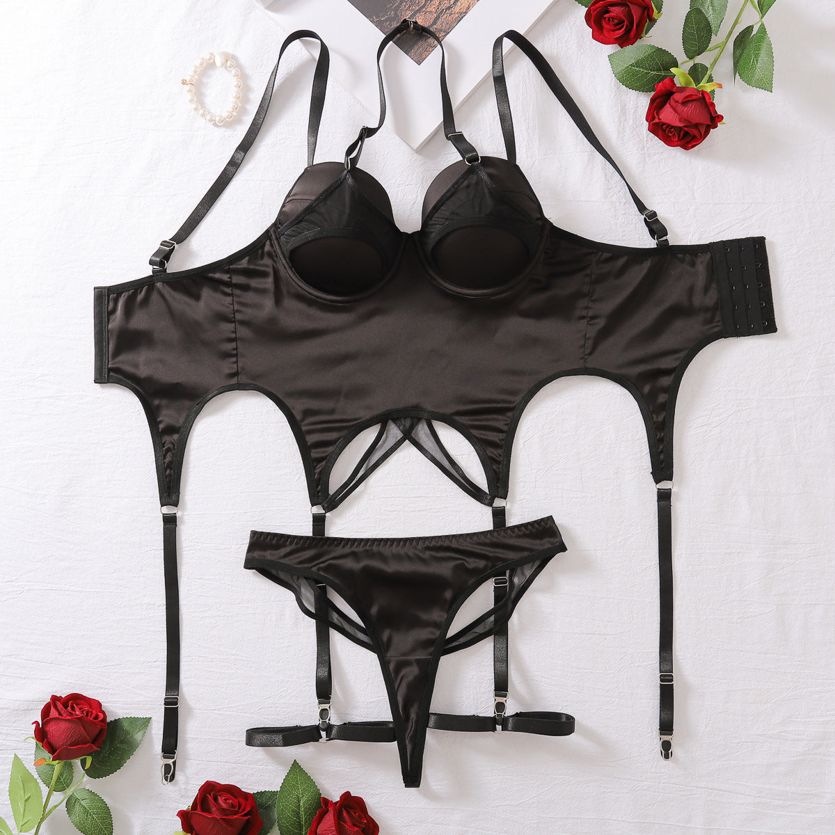 Close-up of the neck-hanging steel ring design on the black mesh bra.