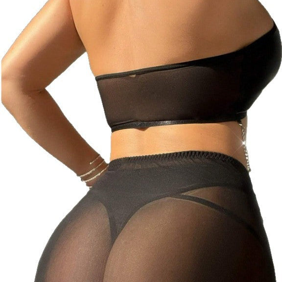 “Side view showing body-hugging fit and provocative detailing on lingerie set”