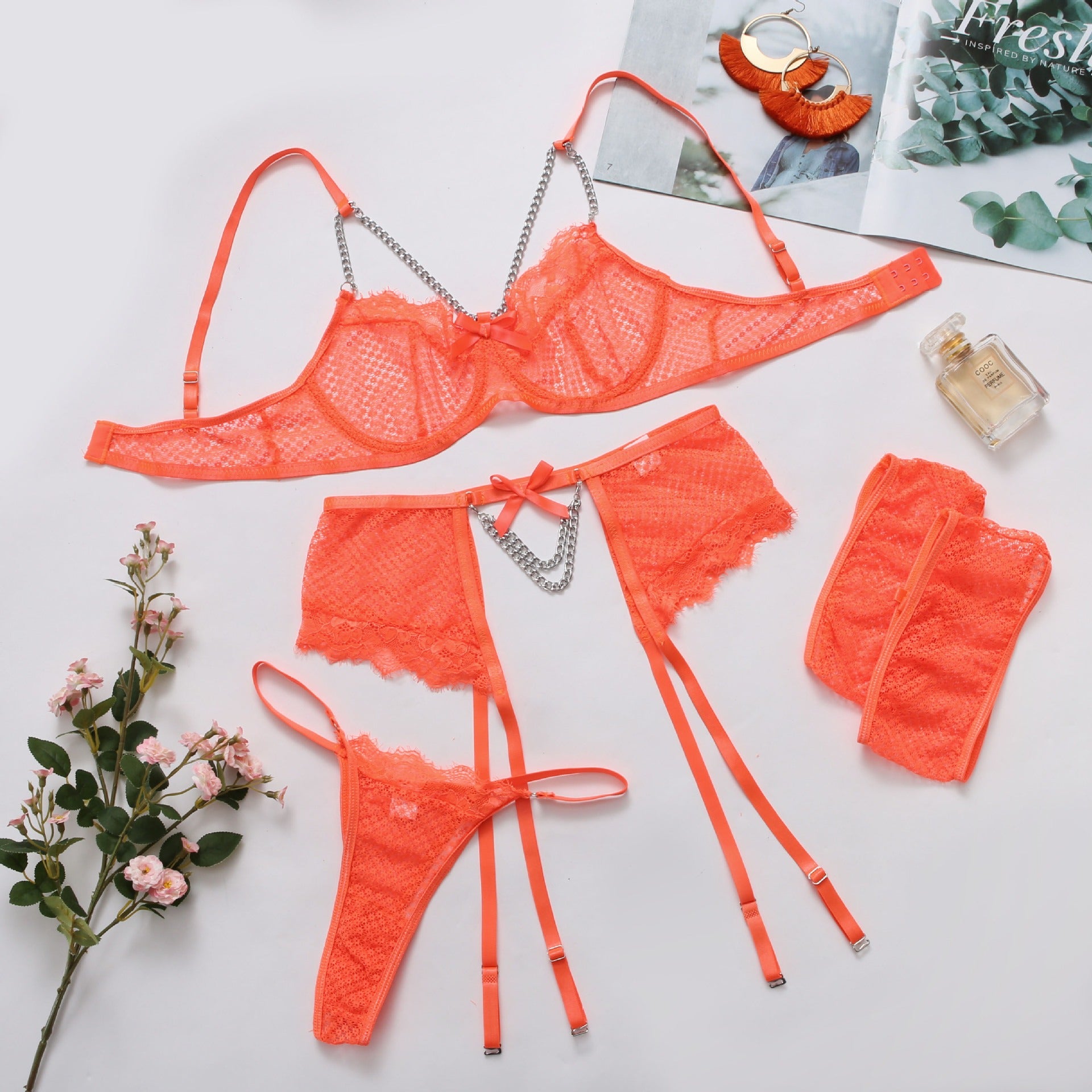 “Side view showing waist bowknot chain and see-through mesh panels”