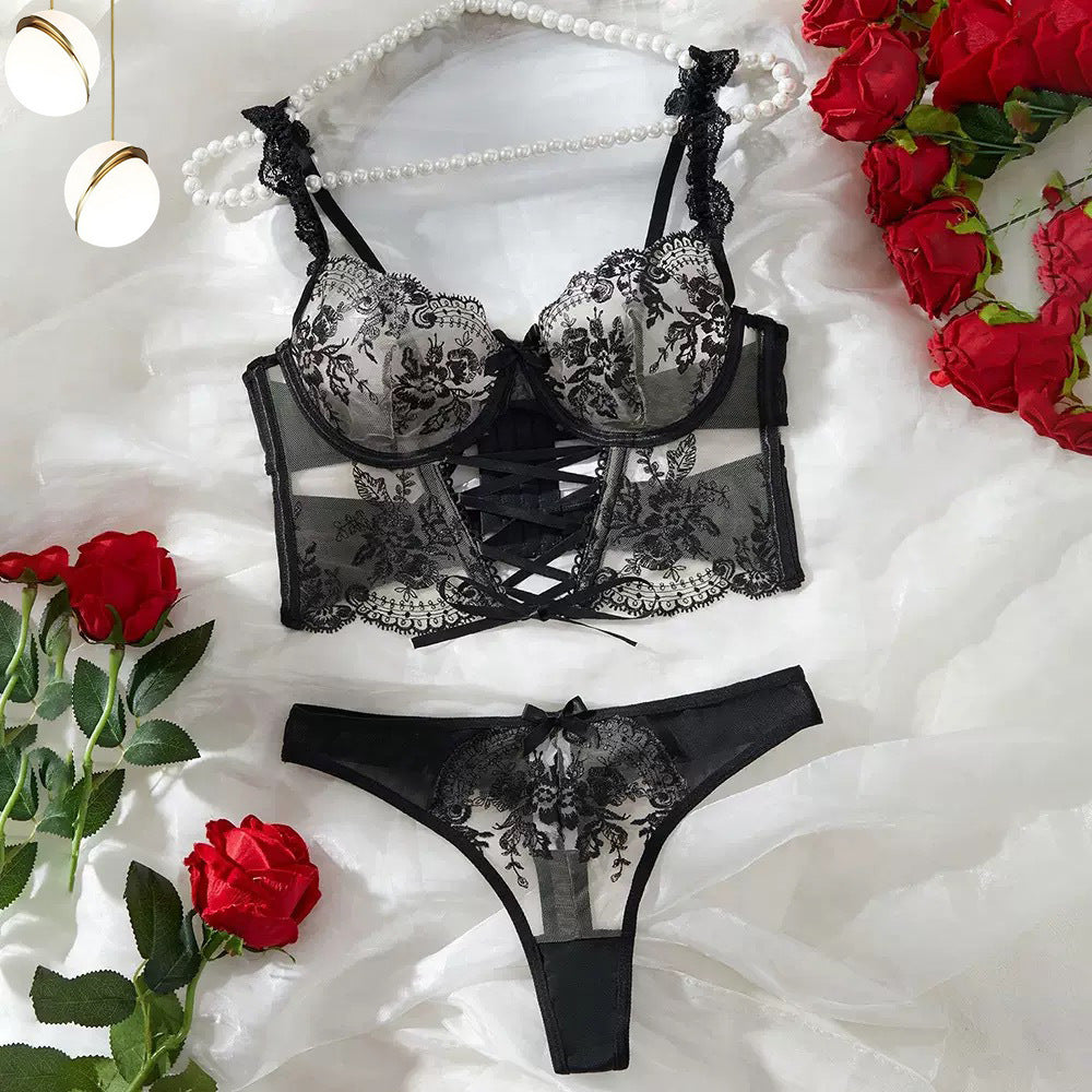 Back view of sheer embroidered mesh lingerie