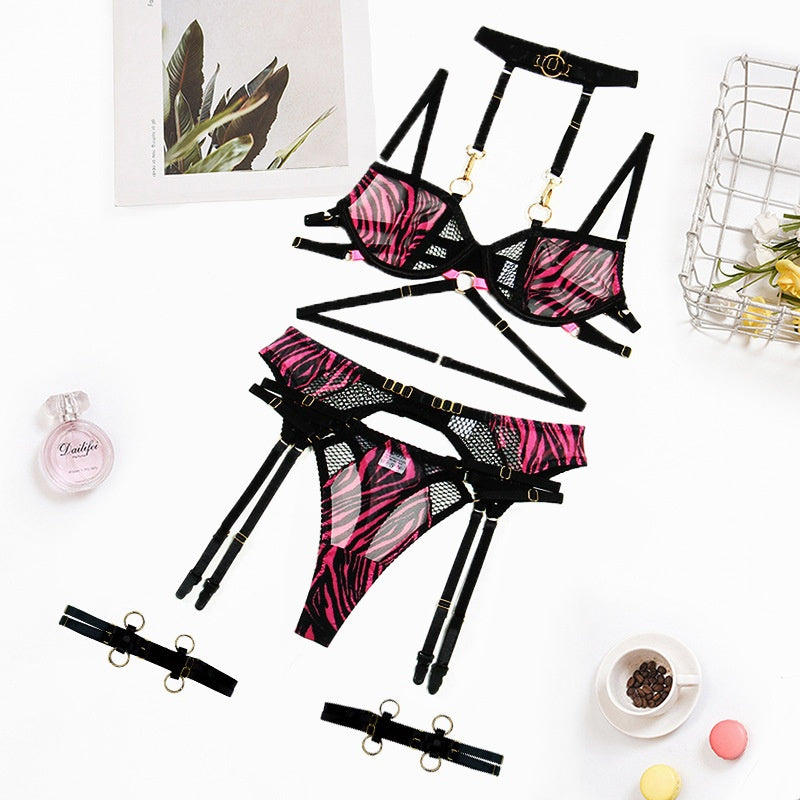 Detail of sheer stretch mesh and detachable straps on neck-hanging lingerie