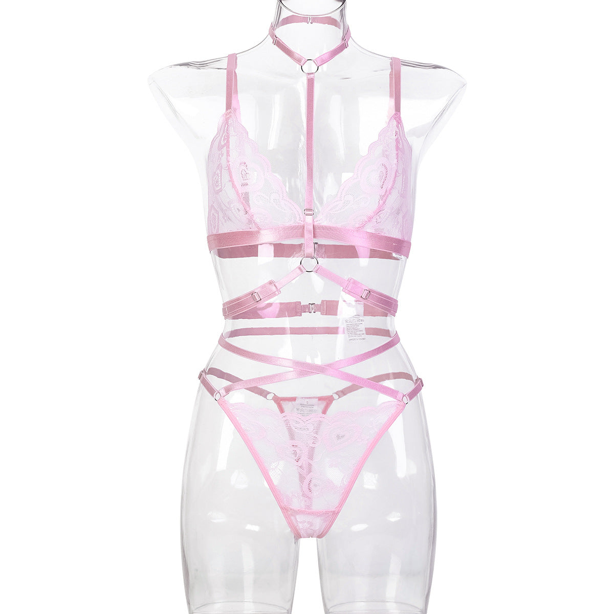 “Close-up of delicate French lace detailing on playful pink strapless lingerie”