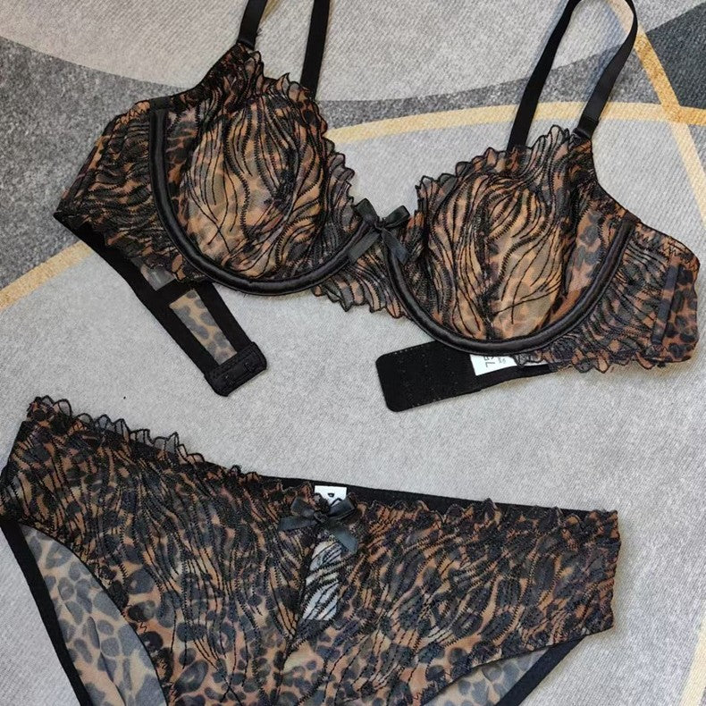 Close-up of lace embroidery on leopard print plus size bra