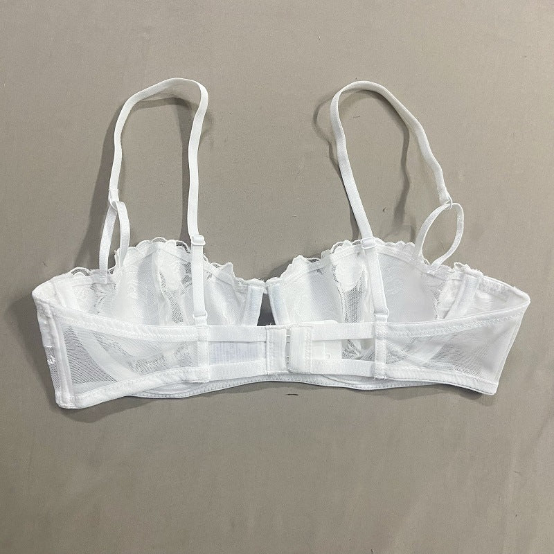 White bra with mesh design on a beige background