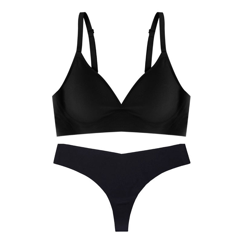 Black bra and panties set on a white background
