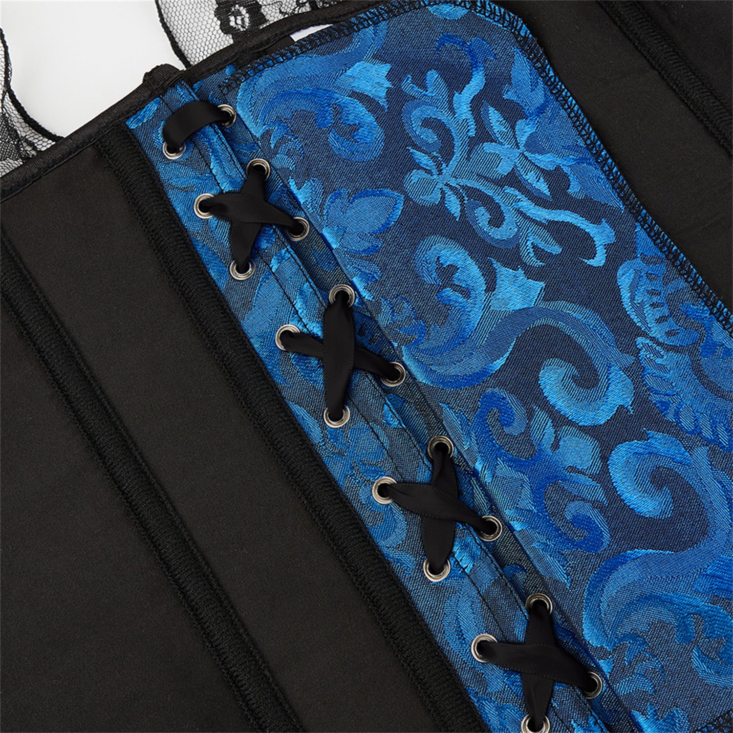 Black lace corset with blue patterned fabric on a white background