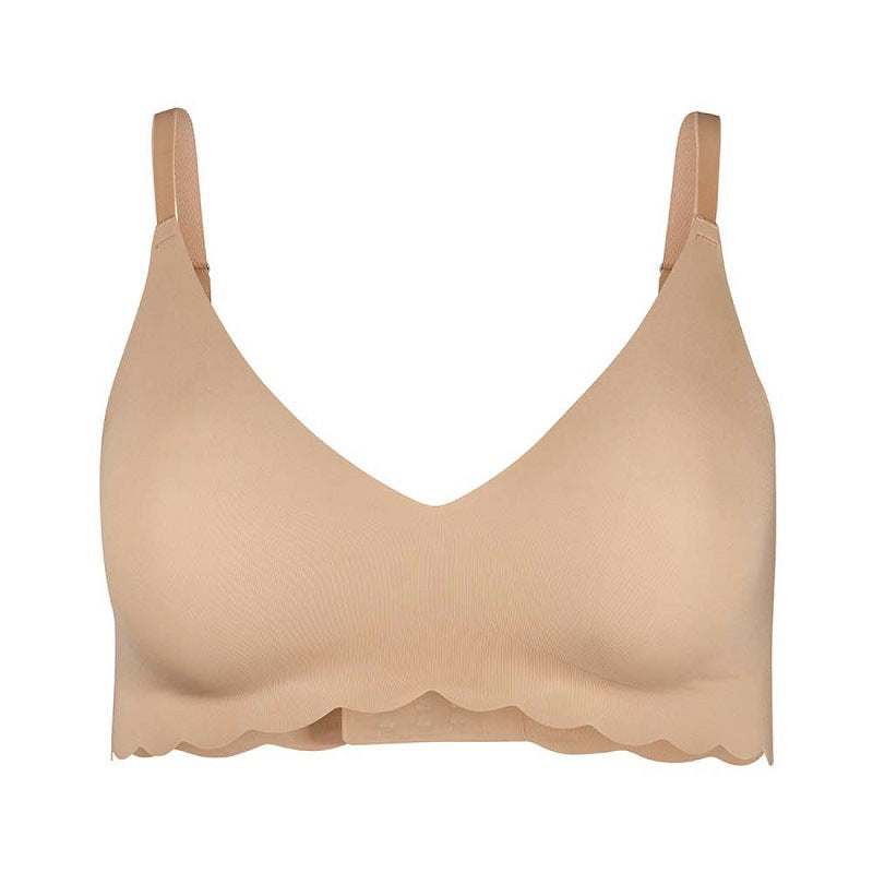Beige bra on a white background