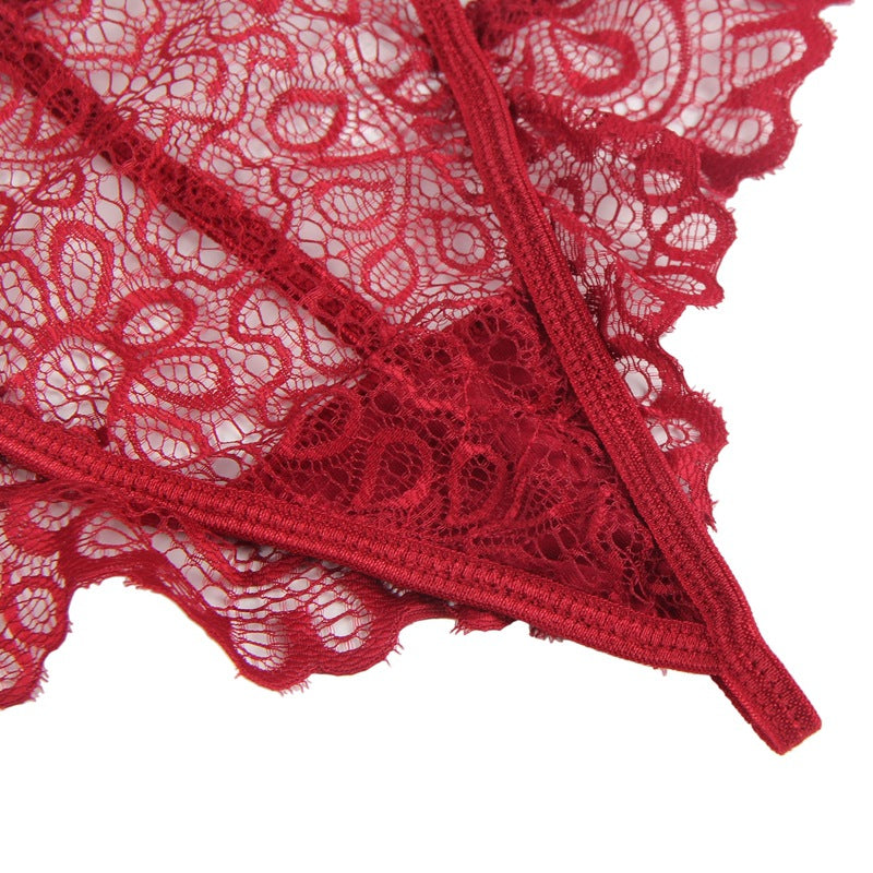 Close-up of red lace fabric on a white background