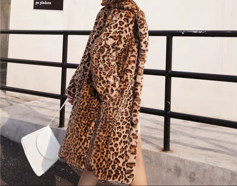 Woman wearing a leopard print coat in an urban setting