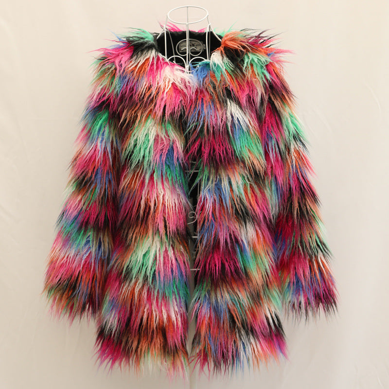 Multicolored fur vest on a hanger against a beige background
