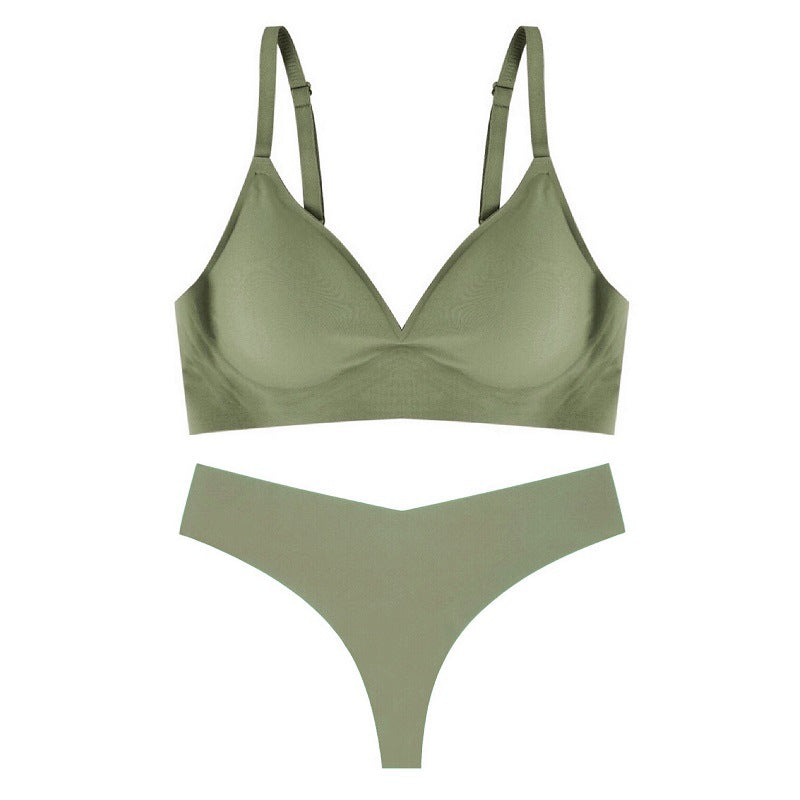 Green bra and panties set on a white background