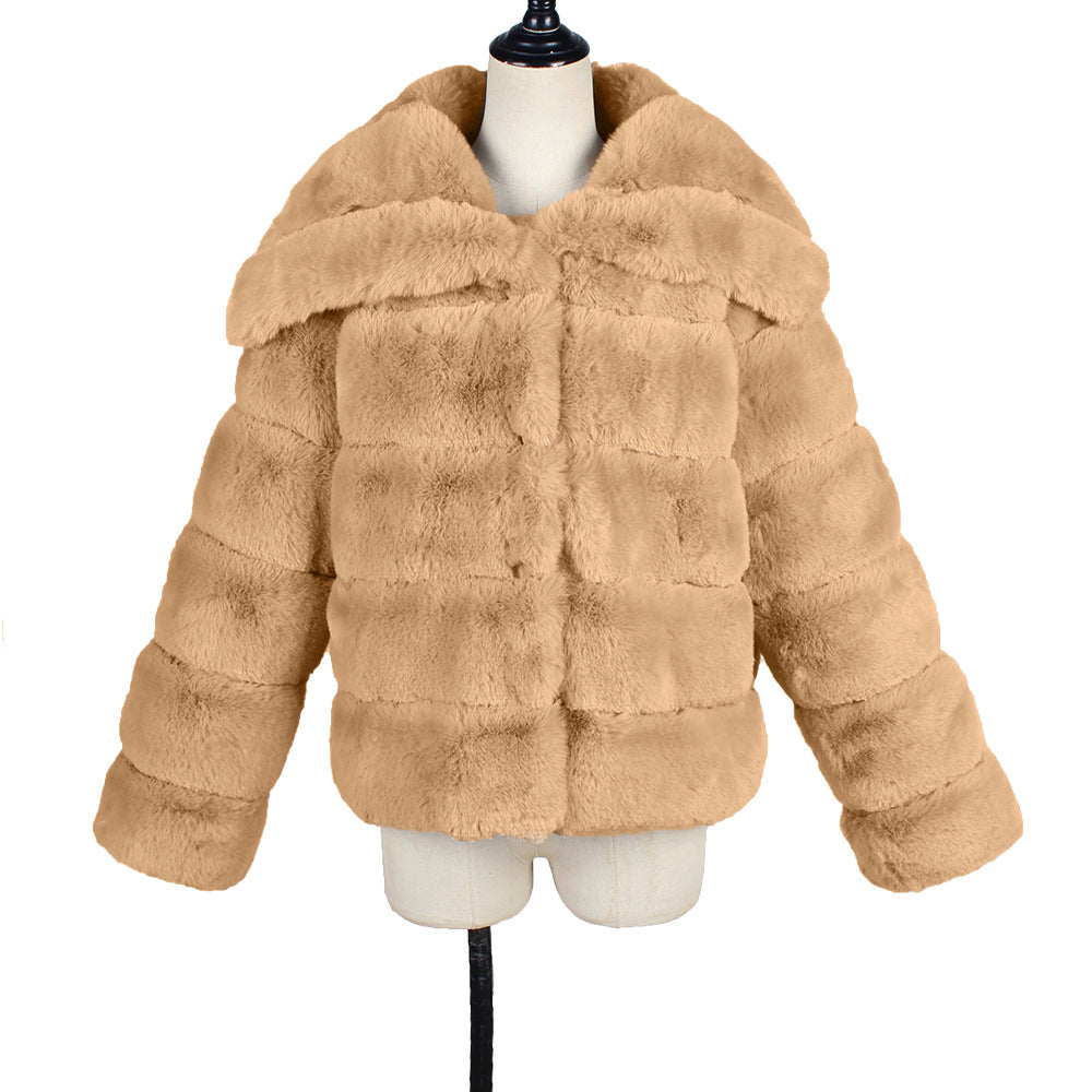 Beige faux fur jacket on a mannequin against a white background