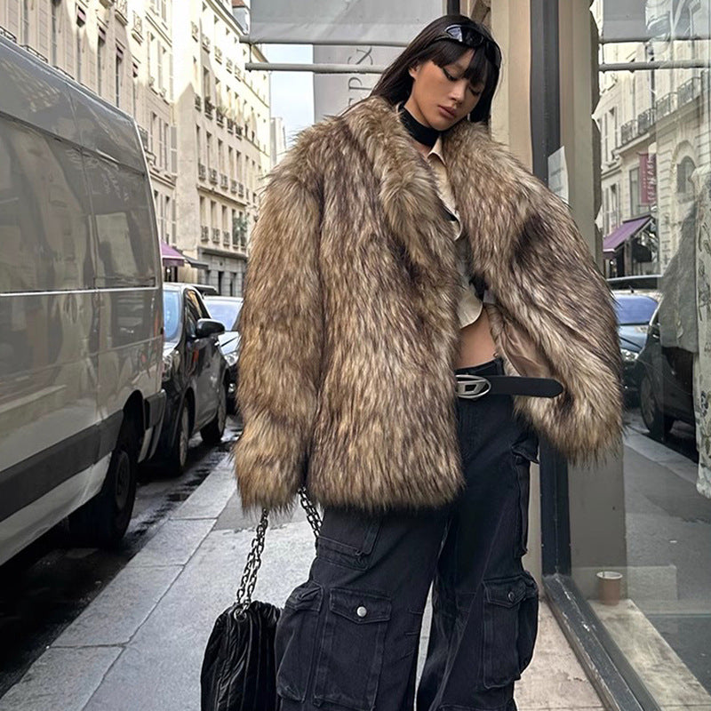 Person wearing a fur coat on a city street