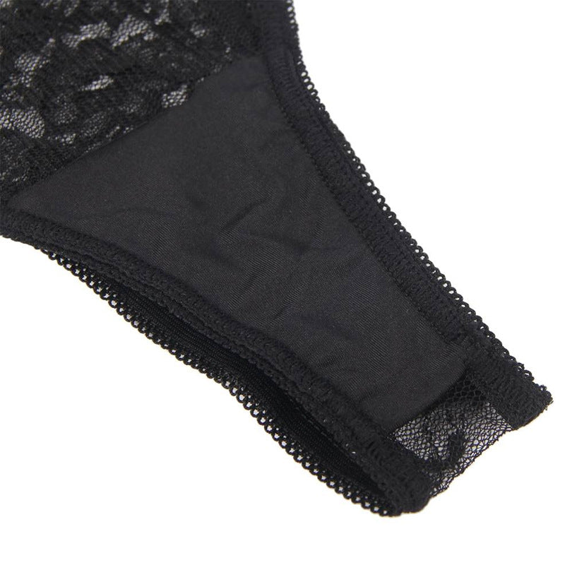 Close-up of black lace fabric on a white background