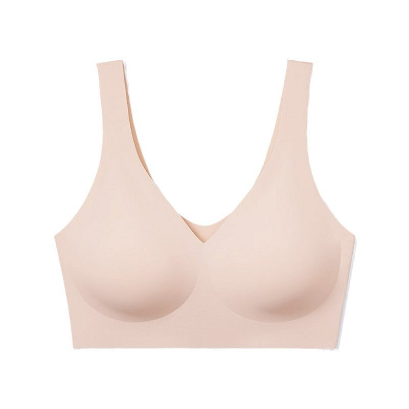 Beige bra on a white background