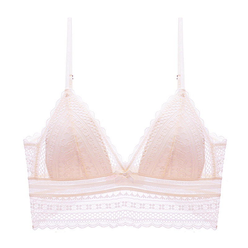 Beige bra with lace details on a white background