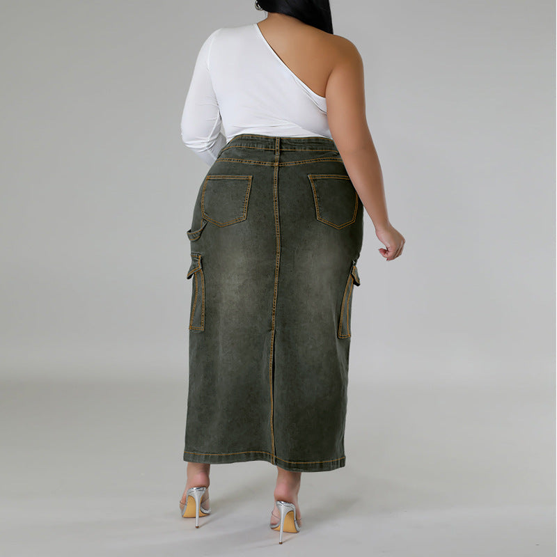 Person wearing a green denim skirt on a plain background plus size denim decoration sleeveless split skirt women jeans in trend