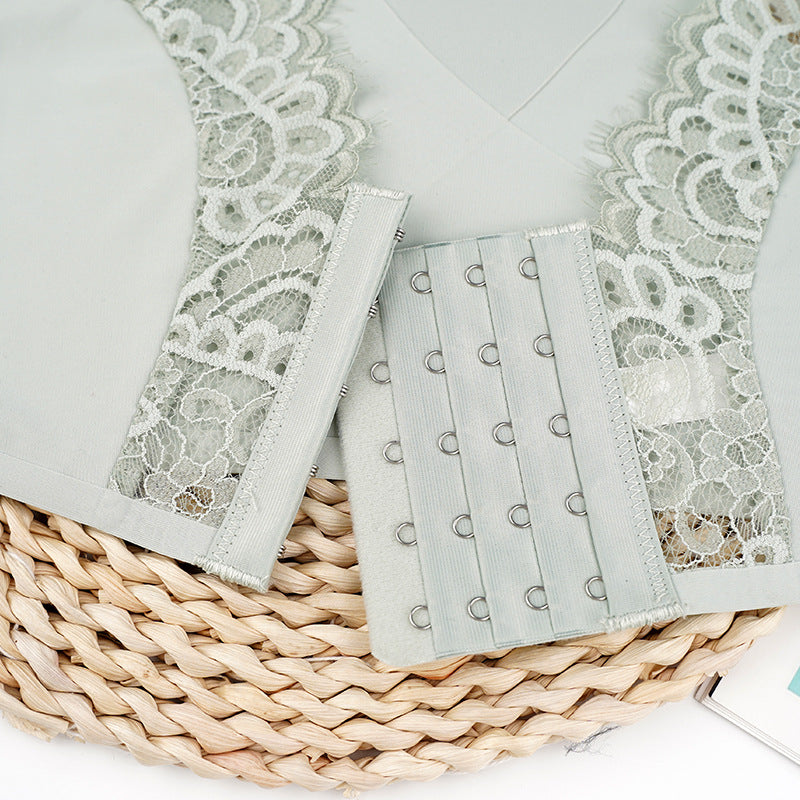 Lace trim and grommet fabric on a woven basket with a white background
