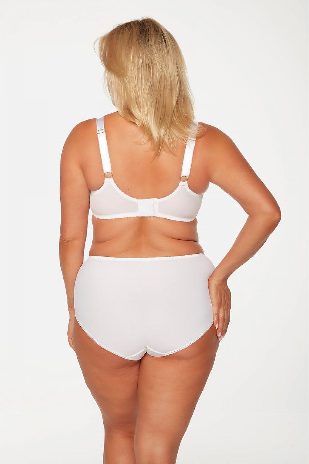 “Side view of white lace full bust bra showing reinforced side panel and underwire support”