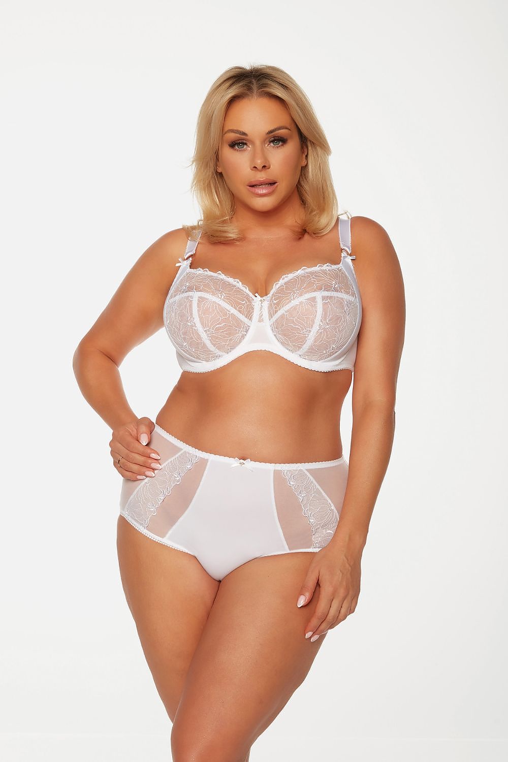 “Back view of white lace soft bra with triple hook-and-eye microfiber closure”