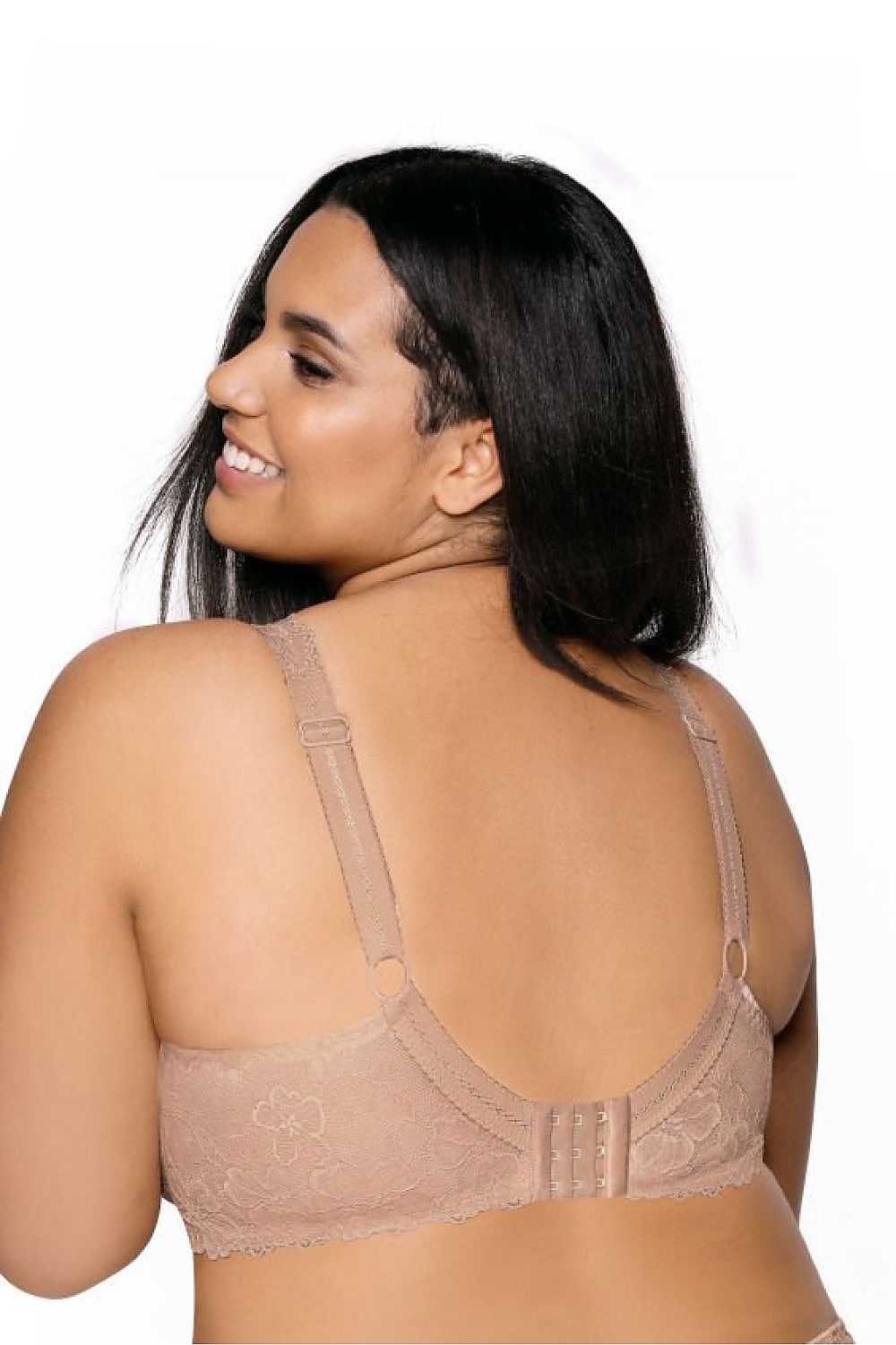 “Front view of red lace bra emphasizing cleavage and bust shape”