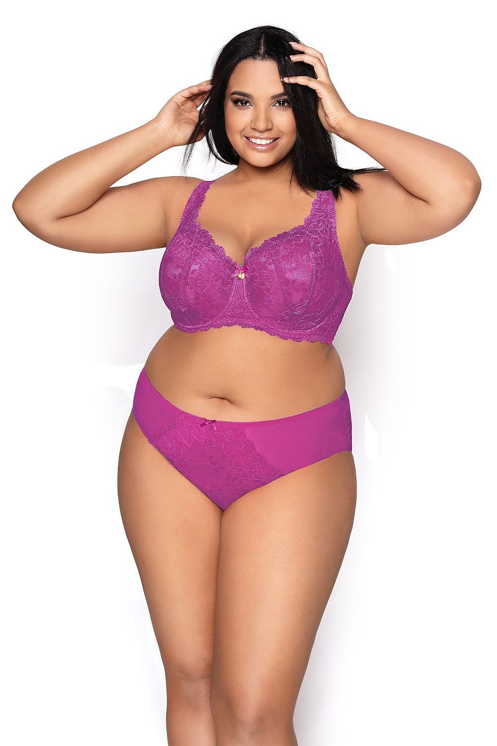“Front view highlighting cleavage and shapely magenta lace cups”
