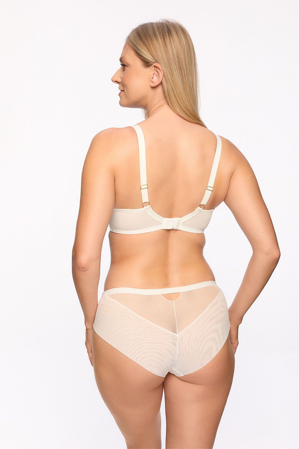 “Close-up of elegant bra highlighting flat seam finish and feminine accents”