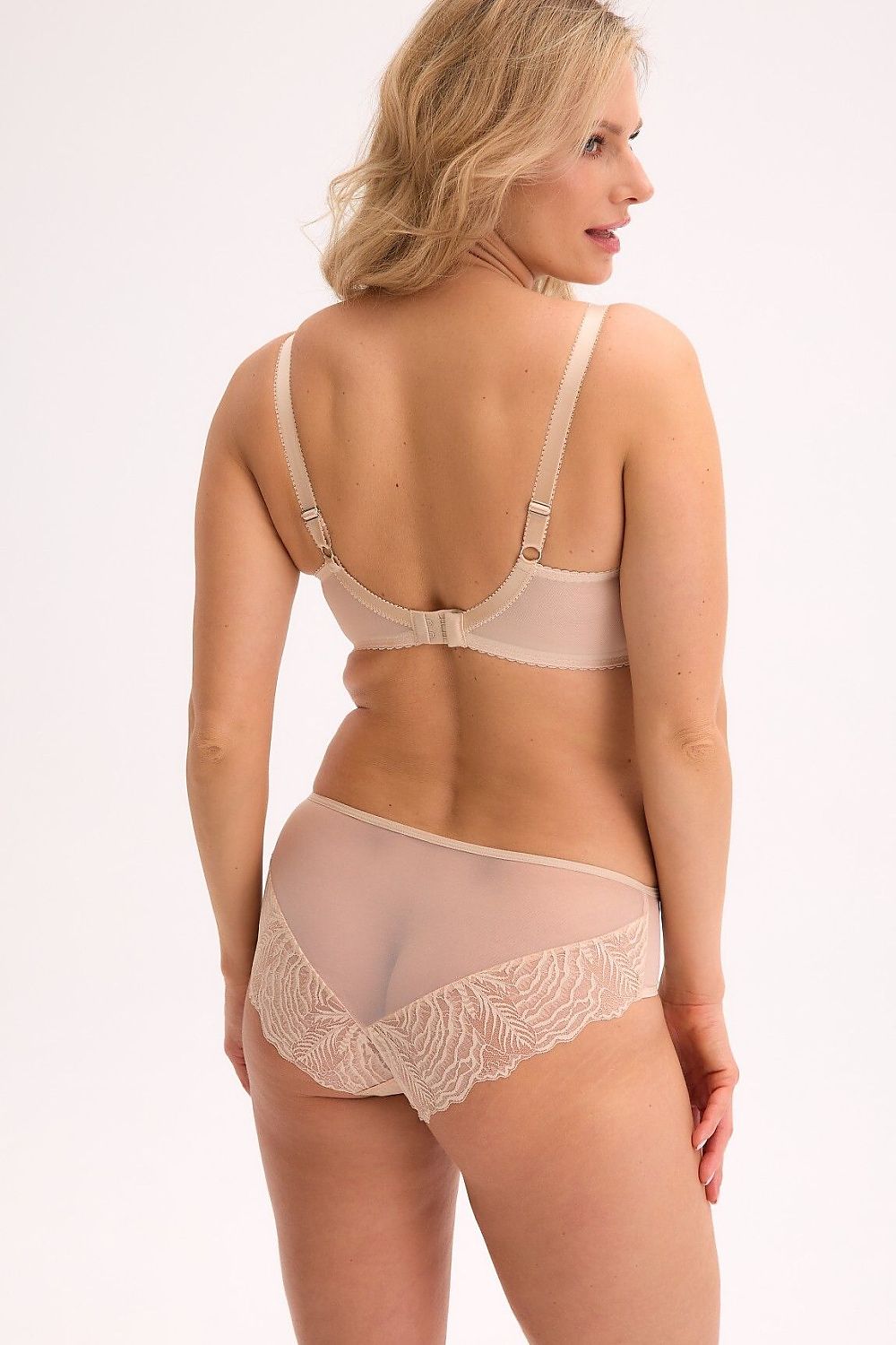 “Side view showing underwire support and lower boning for comfortable fit”