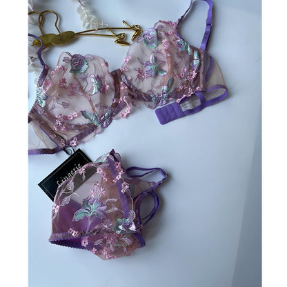 Close-up of floral embroidery and gathered bra detail on plus size lingerie