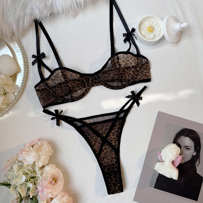 “Close-up of leopard print detailing and French bra design on erotic lingerie set”