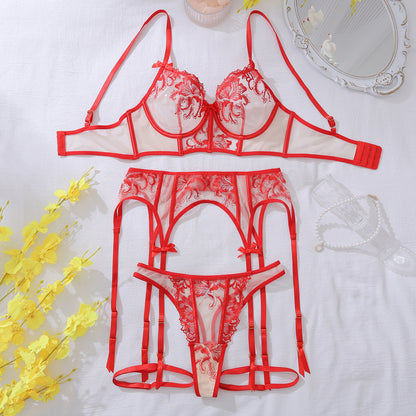 “complete floral lace hollow shaping four-piece split lingerie ensemble styled on mannequin”