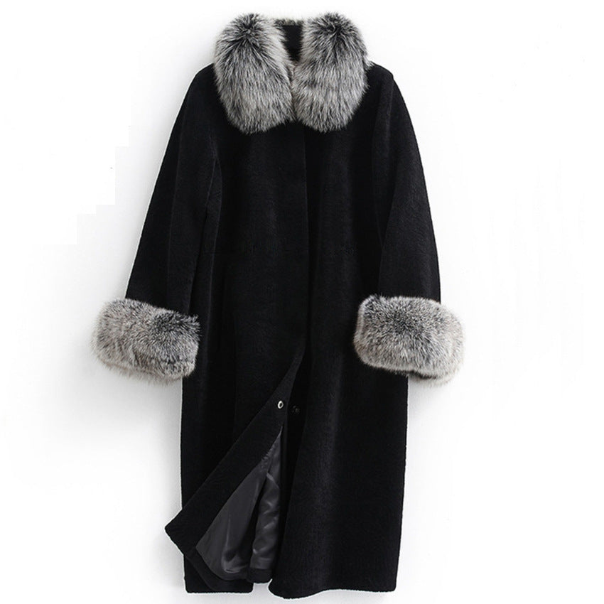Black coat with fur trim on a white background