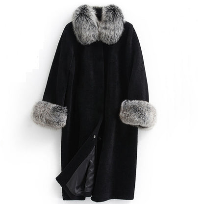 Black coat with fur trim on a white background
