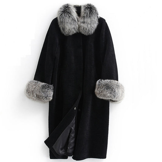 Black coat with fur trim on a white background
