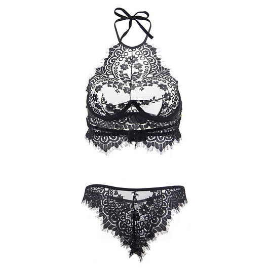 Black lace lingerie set on a white background