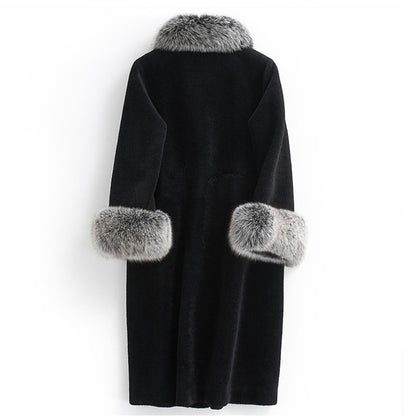 Black coat with fur accents on a white background