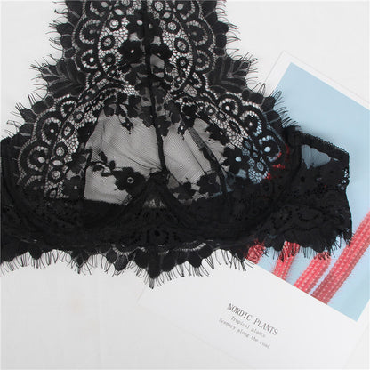 Black lace fabric on a white background with text overlay