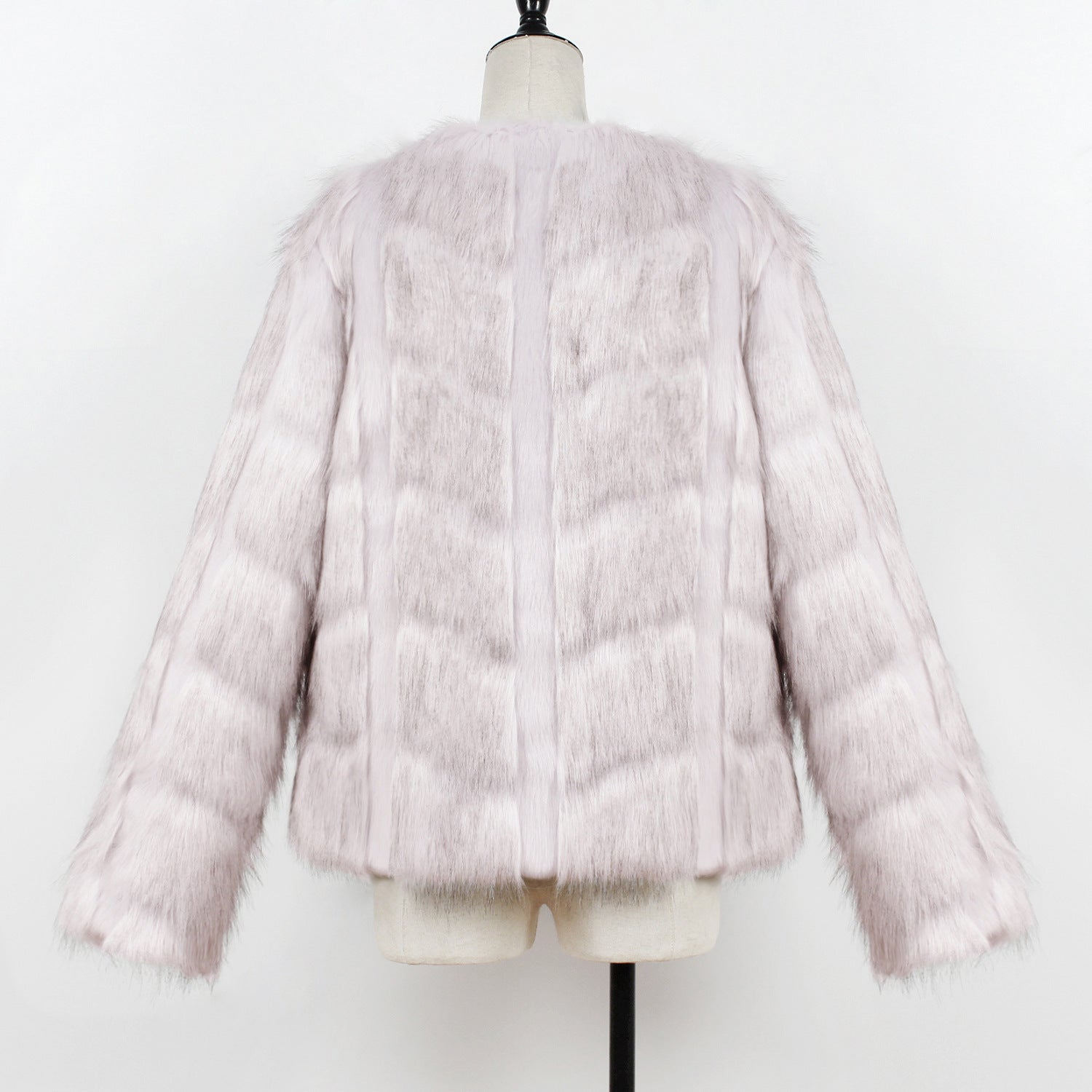 Pink faux fur jacket on a mannequin against a white background