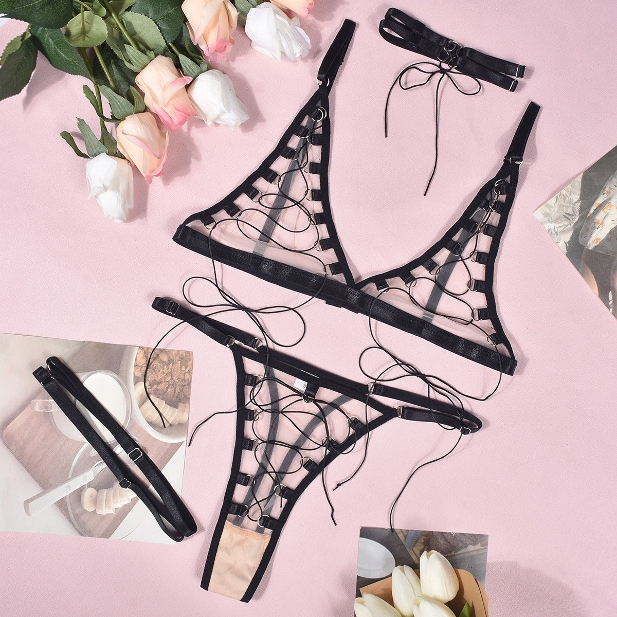 “Close-up of intricate lacing and fabric texture on four-piece erotic lingerie set”